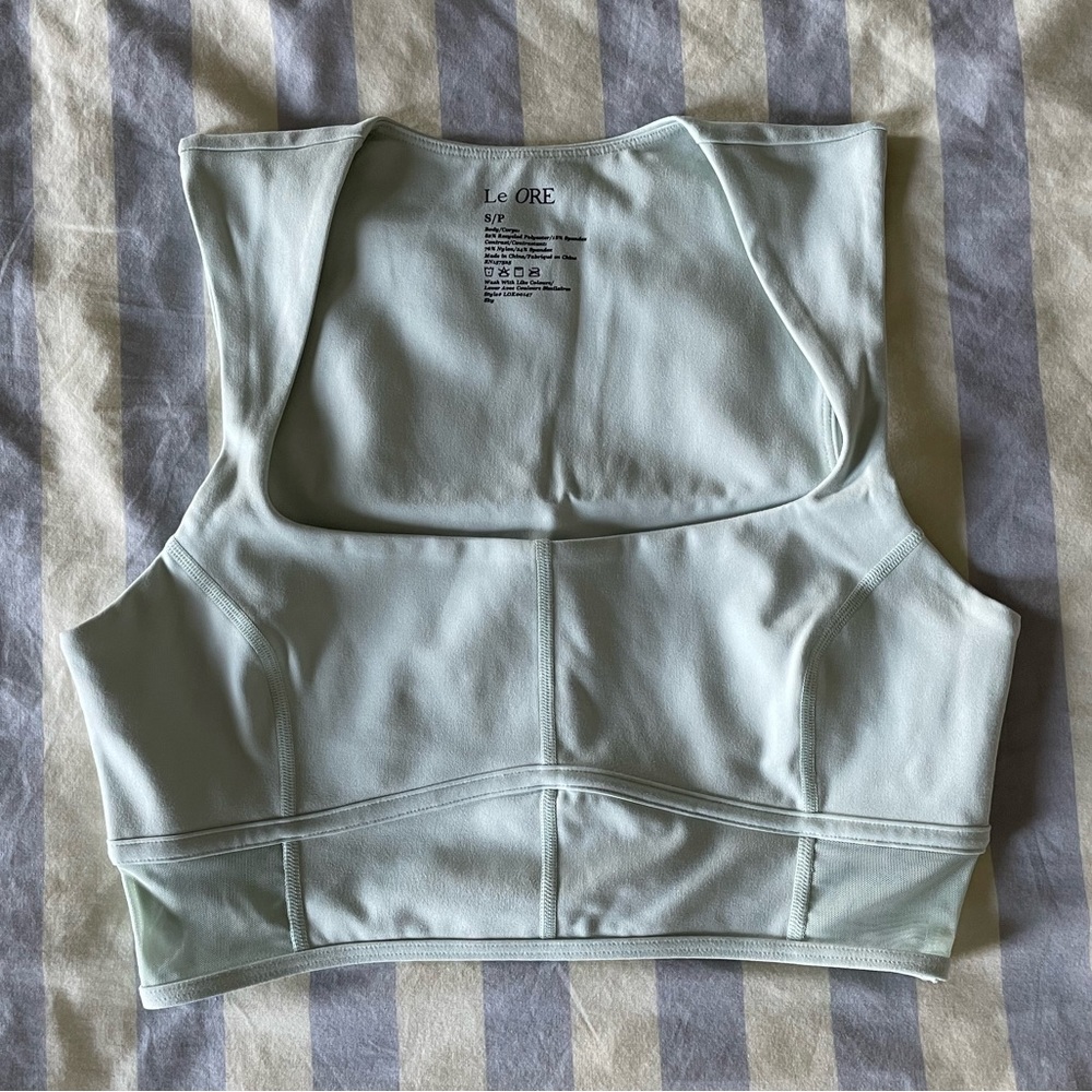 le ore brand "andria" sports bra via bandier color "sky" size s like new